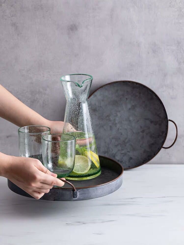 Round Iron Tray | Home Decor cabinet Sleek Contemporary Sophisticated Unique Elegant Decorative Trendy stylish Minimalist Artistic Luxury Designer tabletop table decor accessories tableware living room decor coffee table decor