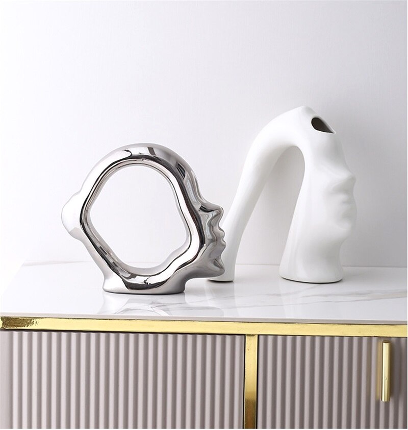 Cuddle Face Vase | Whimsical Ceramic Decor Home Decor cabinet Sleek Contemporary Sophisticated Unique Elegant Decorative Trendy stylish Minimalist Artistic Luxury Designer tabletop table decor accessories tableware living room decor coffee table decor