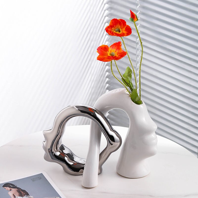 Cuddle Face Vase | Whimsical Ceramic Decor Home Decor cabinet Sleek Contemporary Sophisticated Unique Elegant Decorative Trendy stylish Minimalist Artistic Luxury Designer tabletop table decor accessories tableware living room decor coffee table decor