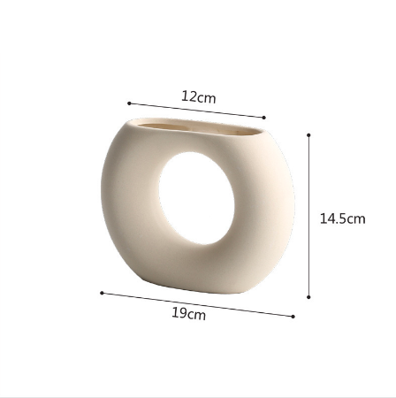 Nordic Ceramic Vase - Donut Shape - Modern Home Decor cabinet Sleek Contemporary Sophisticated Unique Elegant Decorative Trendy stylish Minimalist Artistic Luxury Designer tabletop table decor accessories tableware living room decor coffee table decor