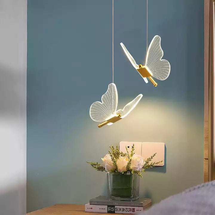 Butterfly Wall Light - Whimsical Wall Illumination Home Decor cabinet Sleek Contemporary Sophisticated Unique Elegant Decorative Trendy stylish Minimalist Artistic Luxury Designer tabletop table decor accessories tableware living room decor coffee table decor