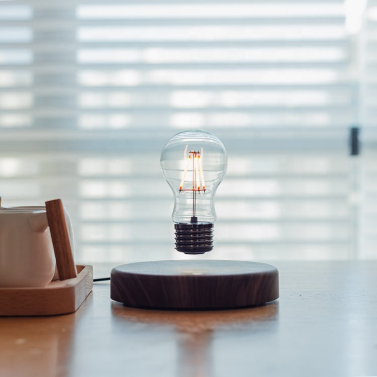 Floating Elegance - Classic Magnetic Levitation Table Lamp Bulb for Mesmerizing Lighting Home Decor cabinet Sleek Contemporary Sophisticated Unique Elegant Decorative Trendy stylish Minimalist Artistic Luxury Designer tabletop table decor accessories tableware living room decor coffee table decor