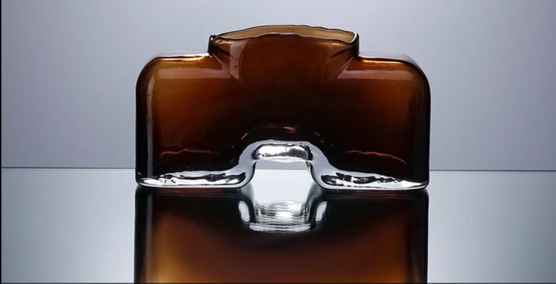 Creative Luxury Amber Glass Vase - Opulent Elegance Home Decor cabinet Sleek Contemporary Sophisticated Unique Elegant Decorative Trendy stylish Minimalist Artistic Luxury Designer tabletop table decor accessories tableware living room decor coffee table decor