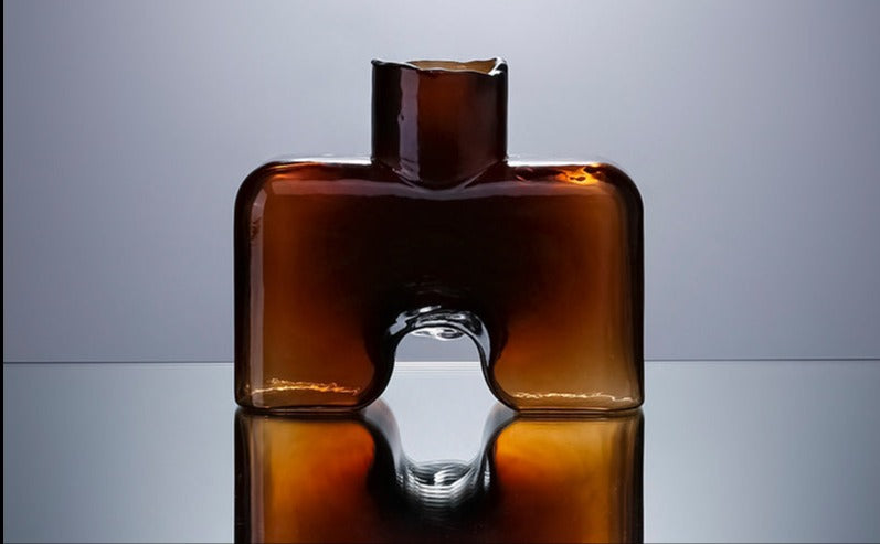 Creative Luxury Amber Glass Vase - Opulent Elegance Home Decor cabinet Sleek Contemporary Sophisticated Unique Elegant Decorative Trendy stylish Minimalist Artistic Luxury Designer tabletop table decor accessories tableware living room decor coffee table decor