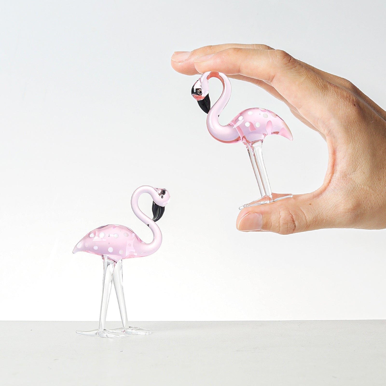 Graceful Radiance: Crystal Flamingo Figures - Home Decor Crystal Sleek Contemporary Sophisticated Unique Elegant Decorative Trendy stylish Chic Minimalist Artistic Luxury Designer tabletop table decor