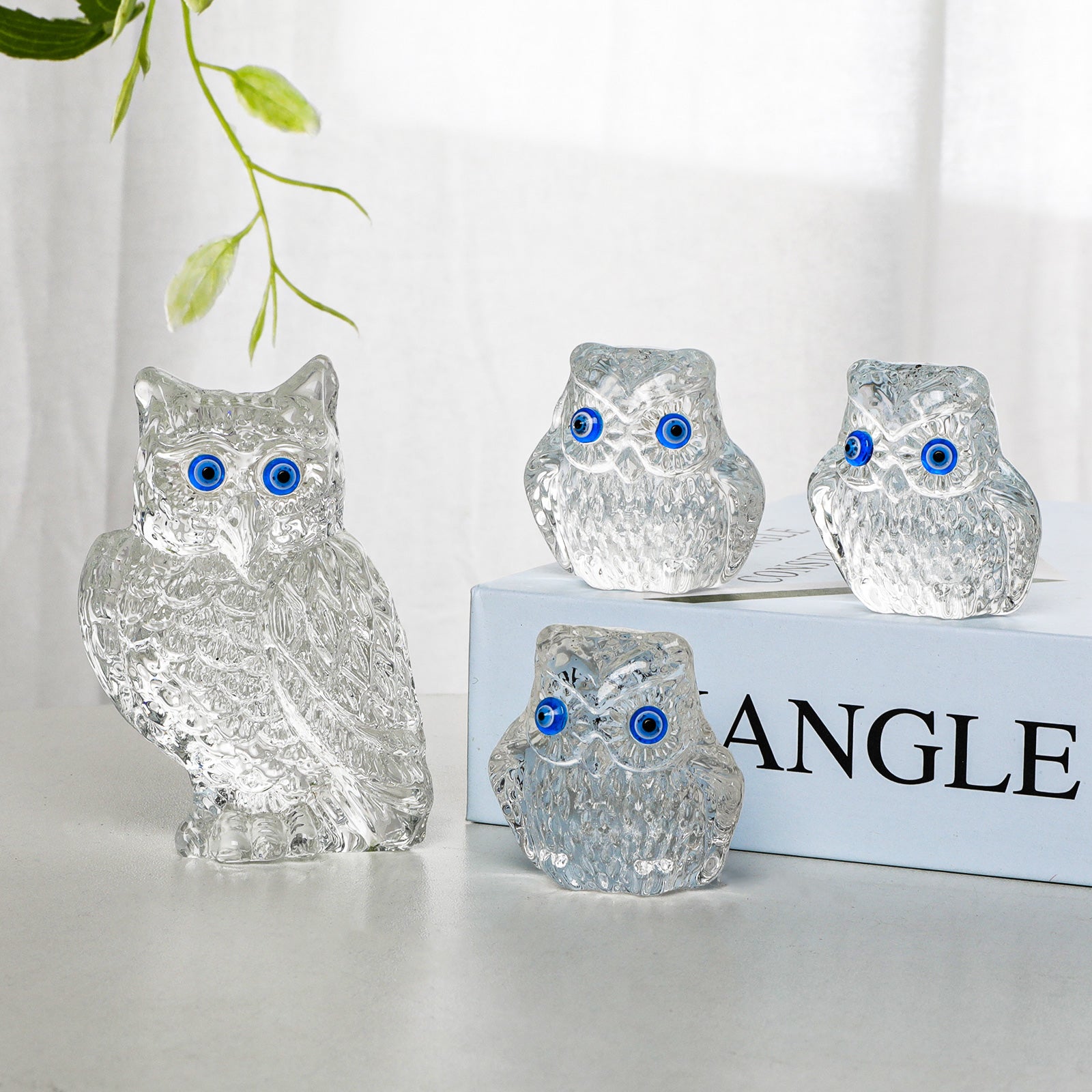 Majestic Presence: Crystal Owl Figure - Home Decor Crystal Sleek Contemporary Sophisticated Unique Elegant Decorative Trendy stylish Chic Minimalist Artistic Luxury Designer tabletop table decor